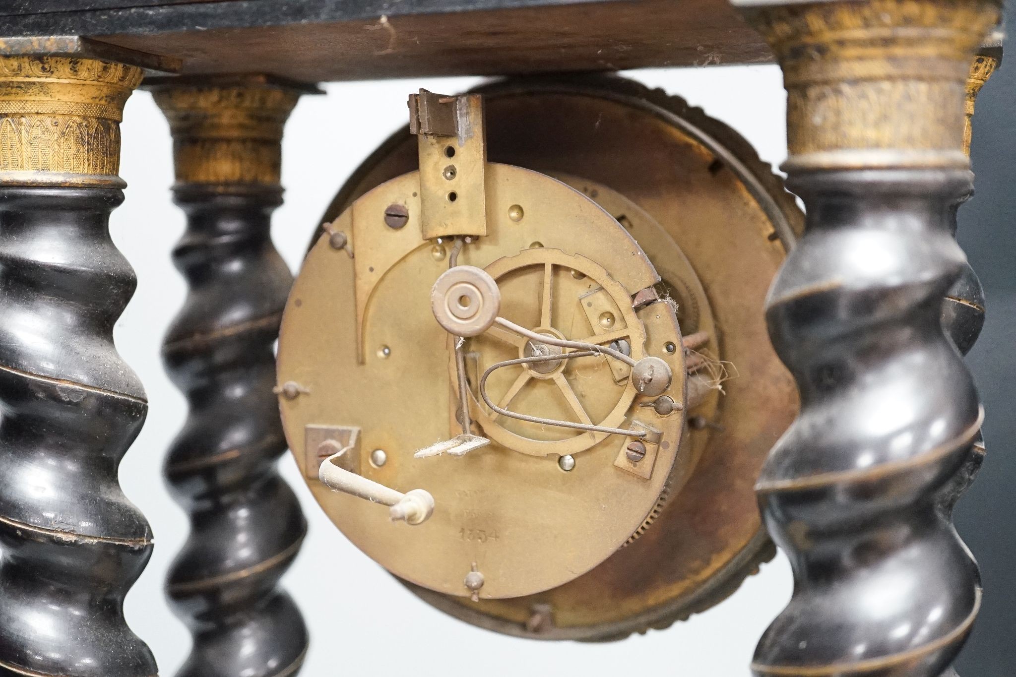 An ebonised and marquetry portico clock, dial signed Valogne, Paris, 56cm high